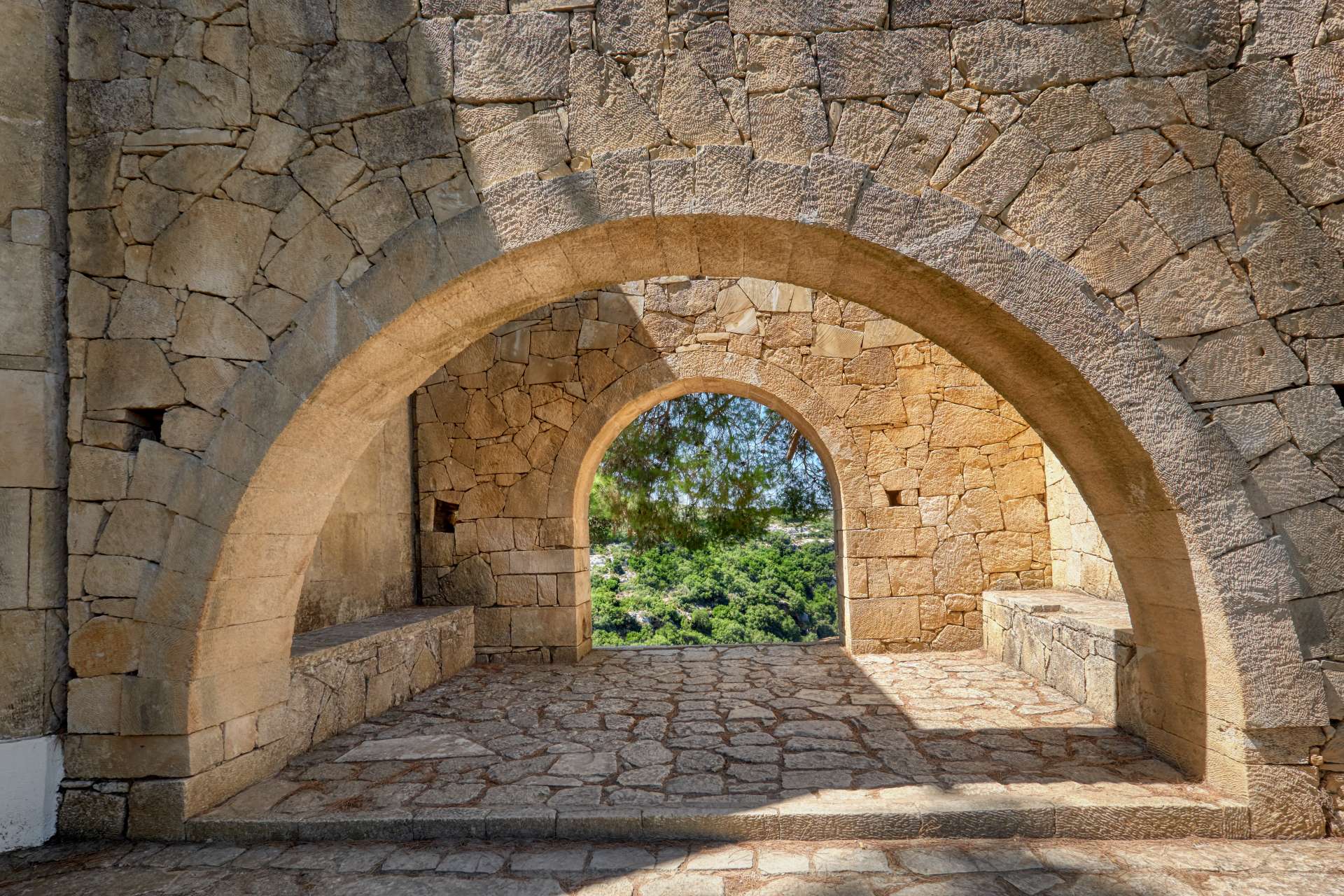 stone-arches-monastery-garden-arkadi-monastery-crete.jpg
